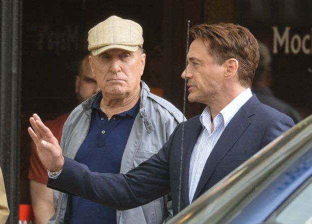 June 6, 2013 - Shelburne Falls, Mass. - Actors Robert Duvall, left, and Robert Downey Jr., in between takes on the set of The Judge, a Warner Brothers movie, in Shelburne Falls Thursday. (Michael S. Gordon /The Republican)