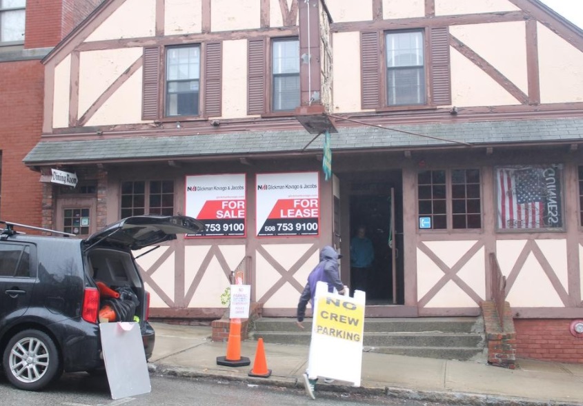 A worker loads signs into the Old Timer on Wednesday. Filming is expected next week inside the closed Clinton restaurant for “Daddy’s Home 2” [Photo/Item: JAN GOTTESMAN}