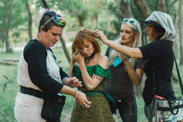 Crewmembers prep Stef Dawson (C) on the Oklahoma City set of Painted Woman. Photo by Priscilla Tran.